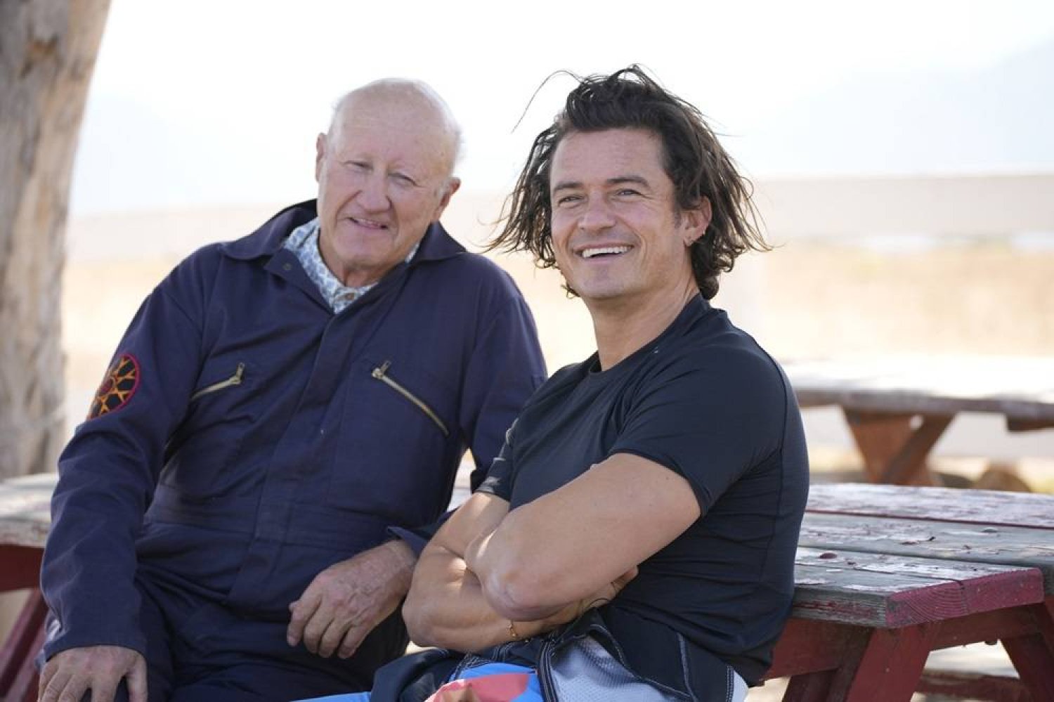  This image released by Peacock shows Chris Copeland and Orlando Bloom in an episode of the television series "Orlando Bloom: To the Edge." (Peacock via AP) 