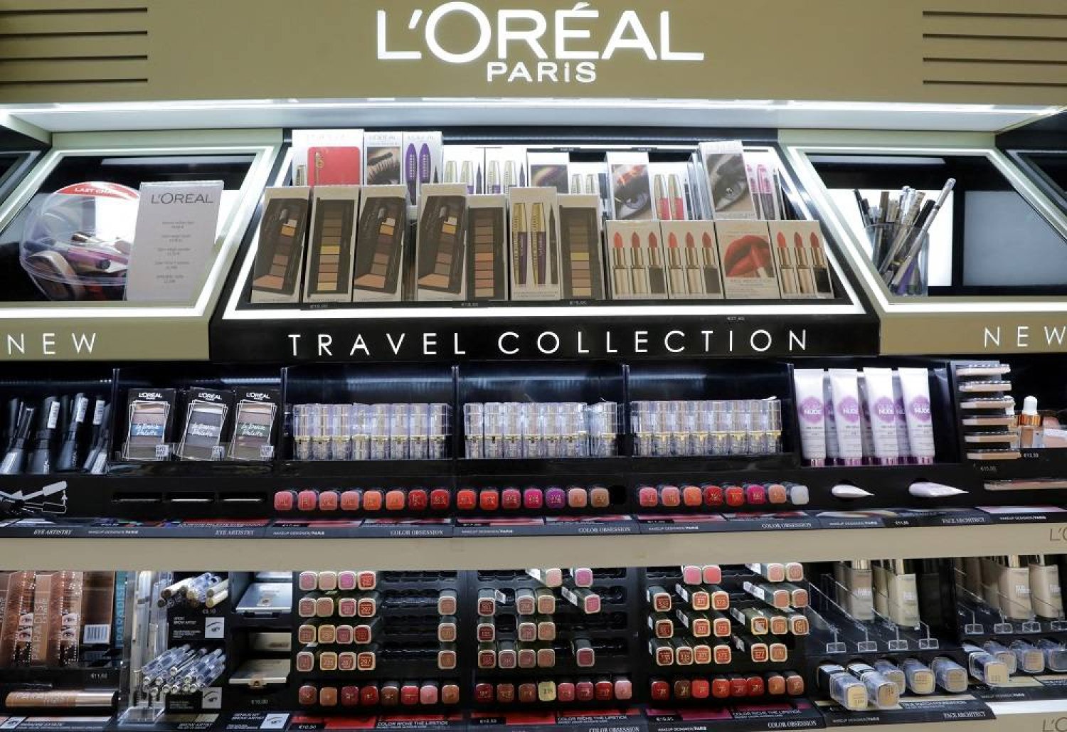 A cosmetic display of French cosmetics group L'Oreal is seen at a duty free shop at the Nice International Airport, in Nice, France, October 10, 2018. (Reuters)