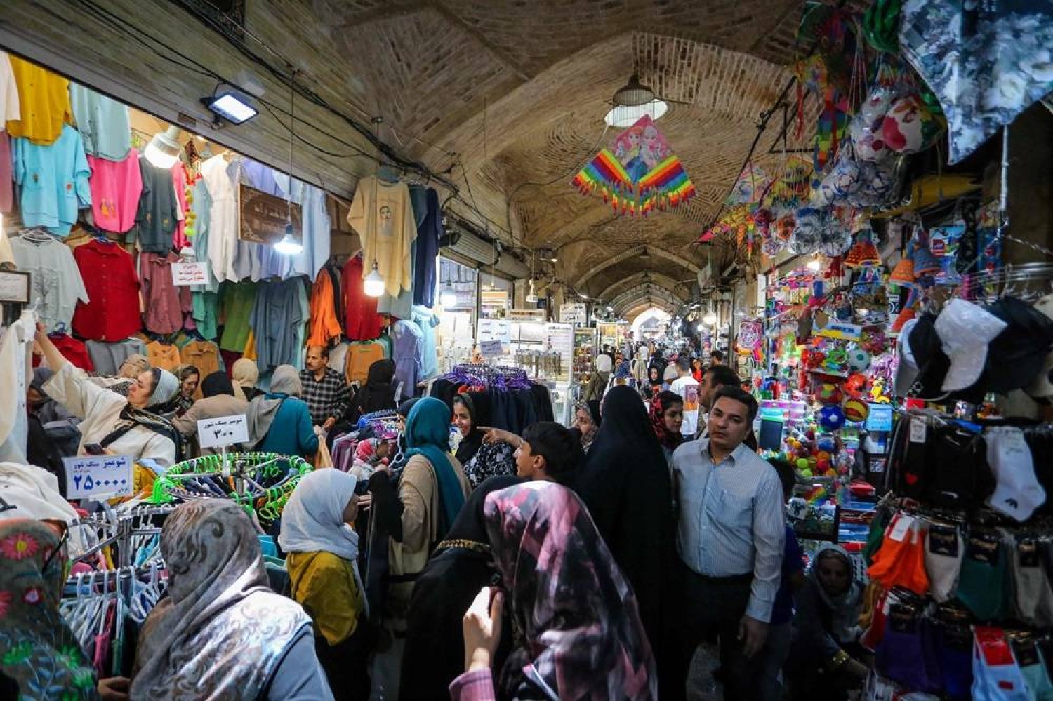 People shop at a bazaar in Iran's central city of Isfahan on April 19, 2024. (IRNA/AFP)