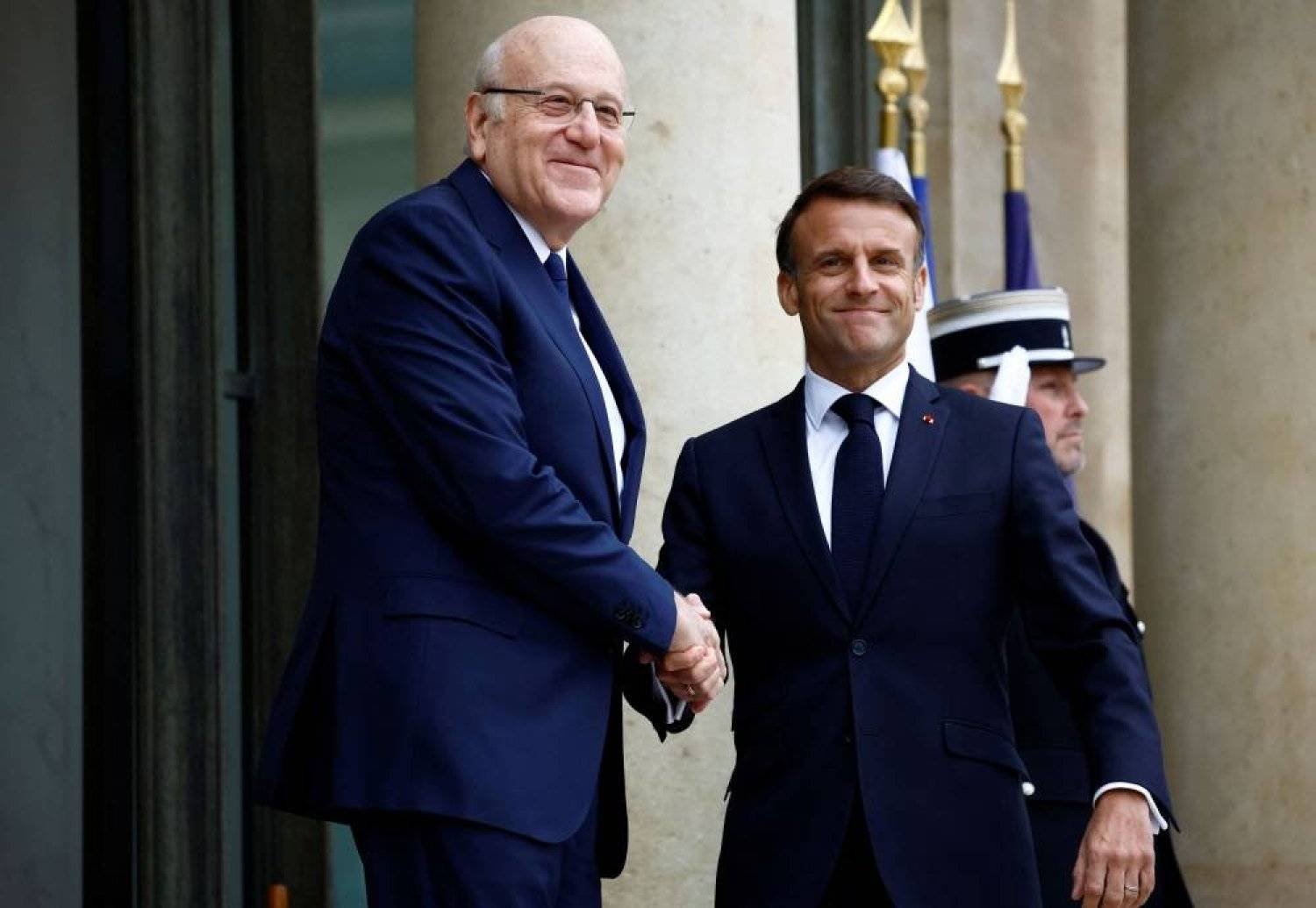 French President Emmanuel Macron receives caretaker Prime Minister Najib Mikati. (Dalati & Nohra)