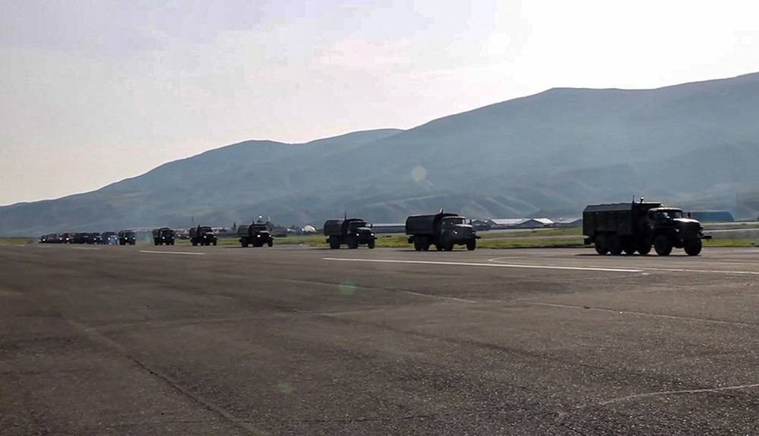 A still image taken from a handout video made available by the Russian Defense Ministry Press-Service shows the beginning of the process of withdrawal from Azerbaijan of the Russian peacekeeping contingent stationed in Karabakh, Kalbajar district, Azerbaijan, 17 April 2024. (EPA /Russian Defense Ministry Press Service / Handout) 