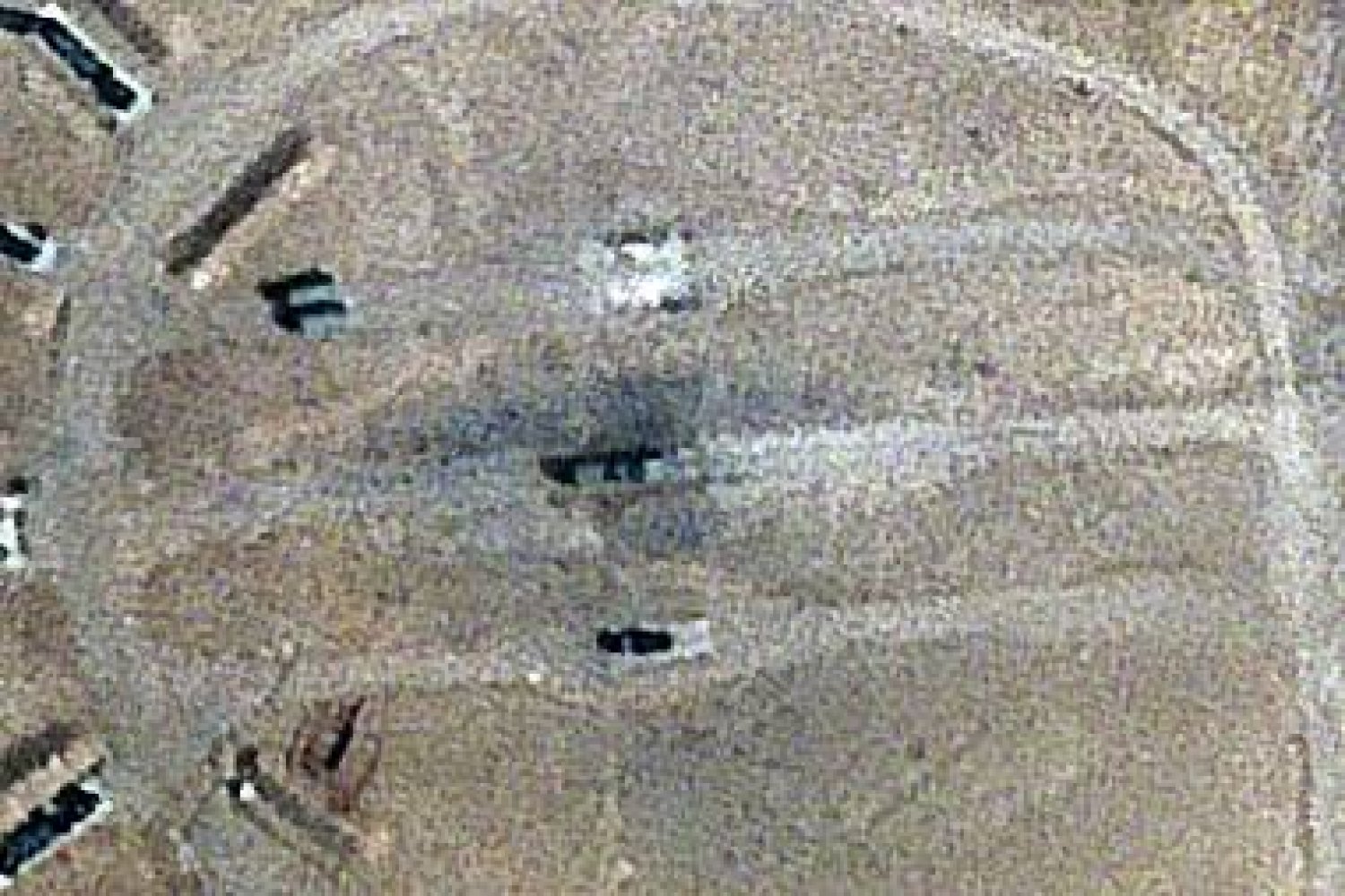 Burn marks surround what analysts identify as a radar system for a Russian-made S-300 missile battery, center, near an international airport and air base is seen in Isfahan, Iran, Monday, April 22, 2024. (Planet Labs PBC via AP)