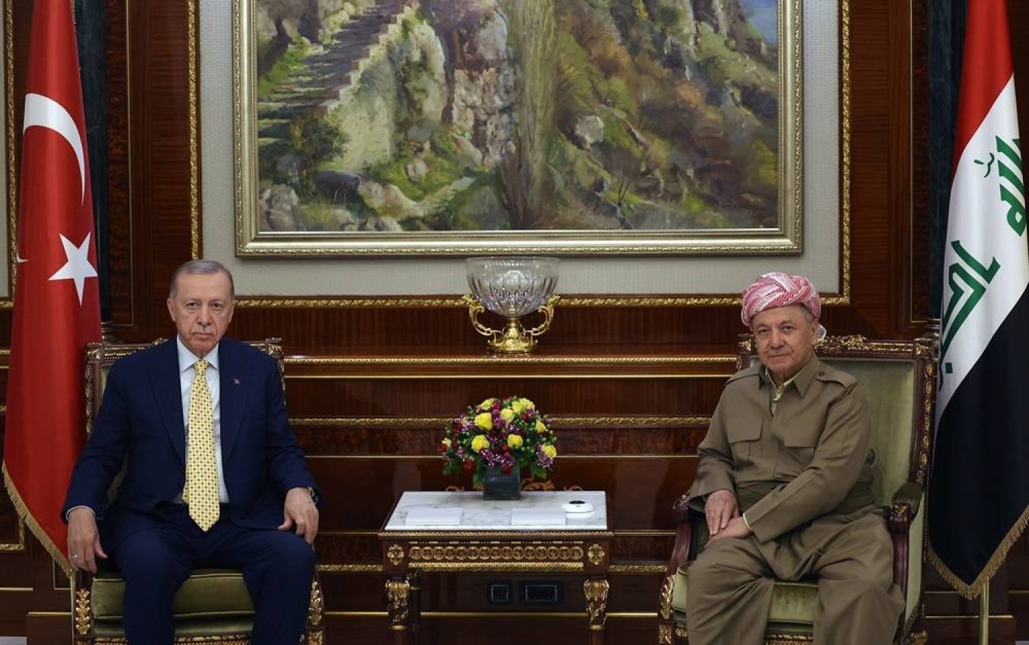 A handout photo made available by the Turkish Presidential press office shows Former President of Iraqi Kurdistan Region and leader of the Kurdistan Democratic Party (KDP) Masoud Barzani (R) and Turkish President Recep Tayyip Erdogan (L) posing for the media before their meeting in Erbil, northern Iraq, 22 April 2024. (EPA/Murat Cetin Muhurdar/Turkish Presidential Press Office/Handout) 
