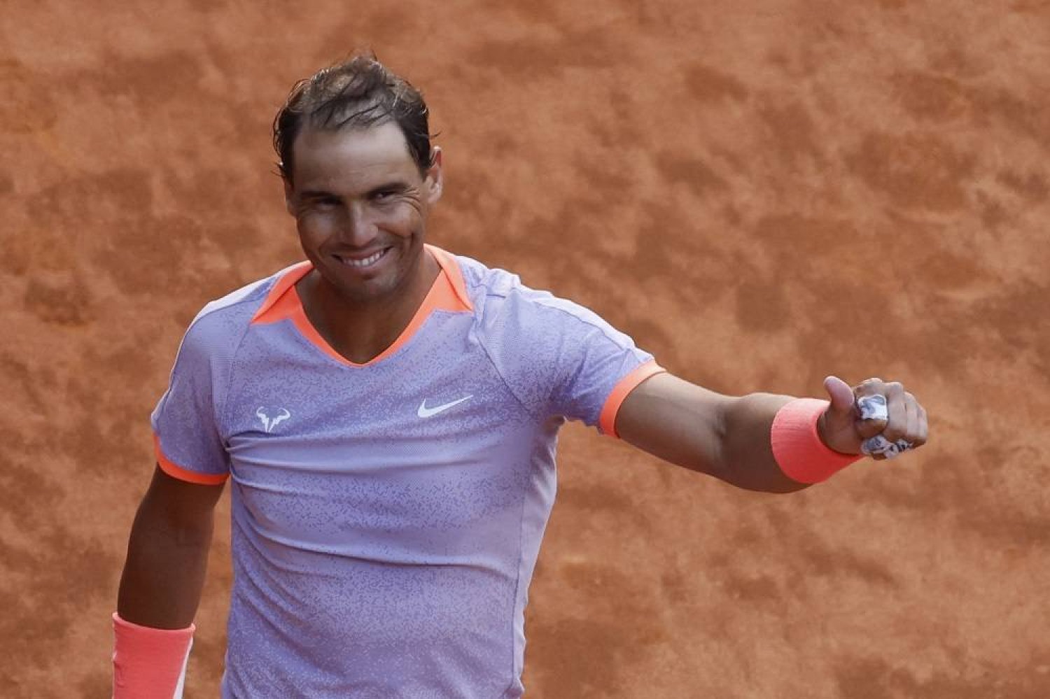 Spain's Rafael Nadal celebrates after beating US' Darwin Blanch during the 2024 ATP Tour Madrid Open tennis tournament singles match at Caja Magica in Madrid on April 25, 2024. (AFP)