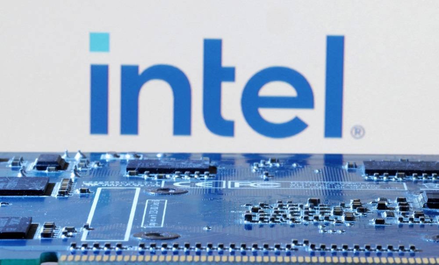 Intel logo is seen near computer motherboard in this illustration taken January 8, 2024. (Reuters)