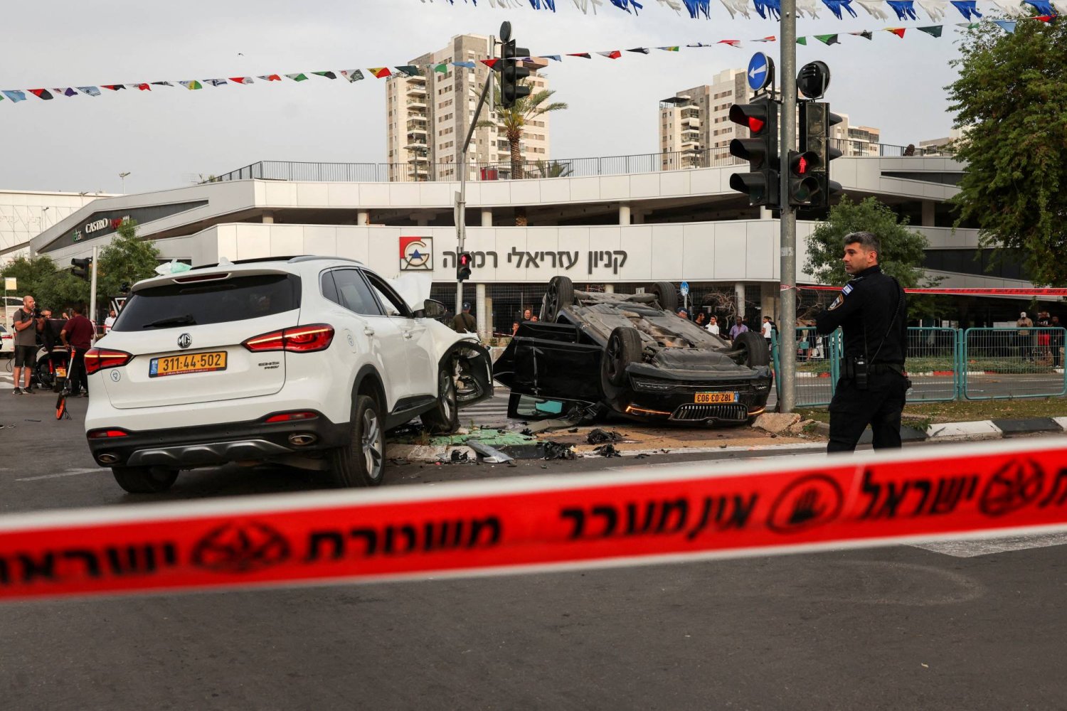 The car of Israel's National Security Minister Itamar Ben Gvir is seen upturned after an accident in Ramle, Israel April 26, 2024 REUTERS/Shannon Stapleton  