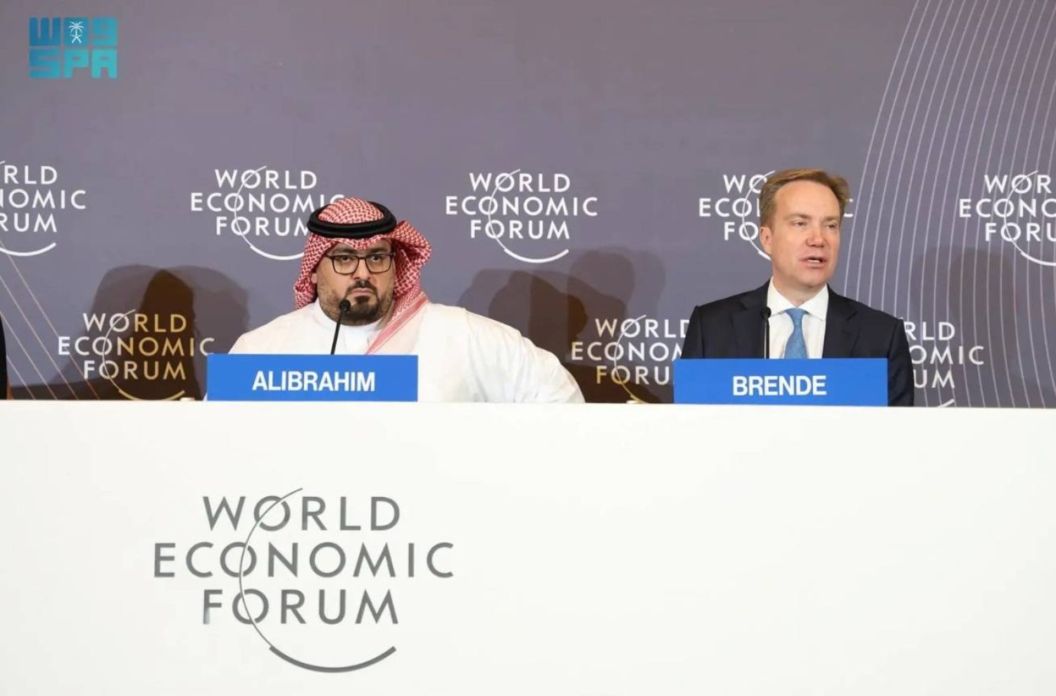 Saudi Minister of Economy and Planning Faisal bin Fadhil Alibrahim and WEF President Borge Brende. SPA