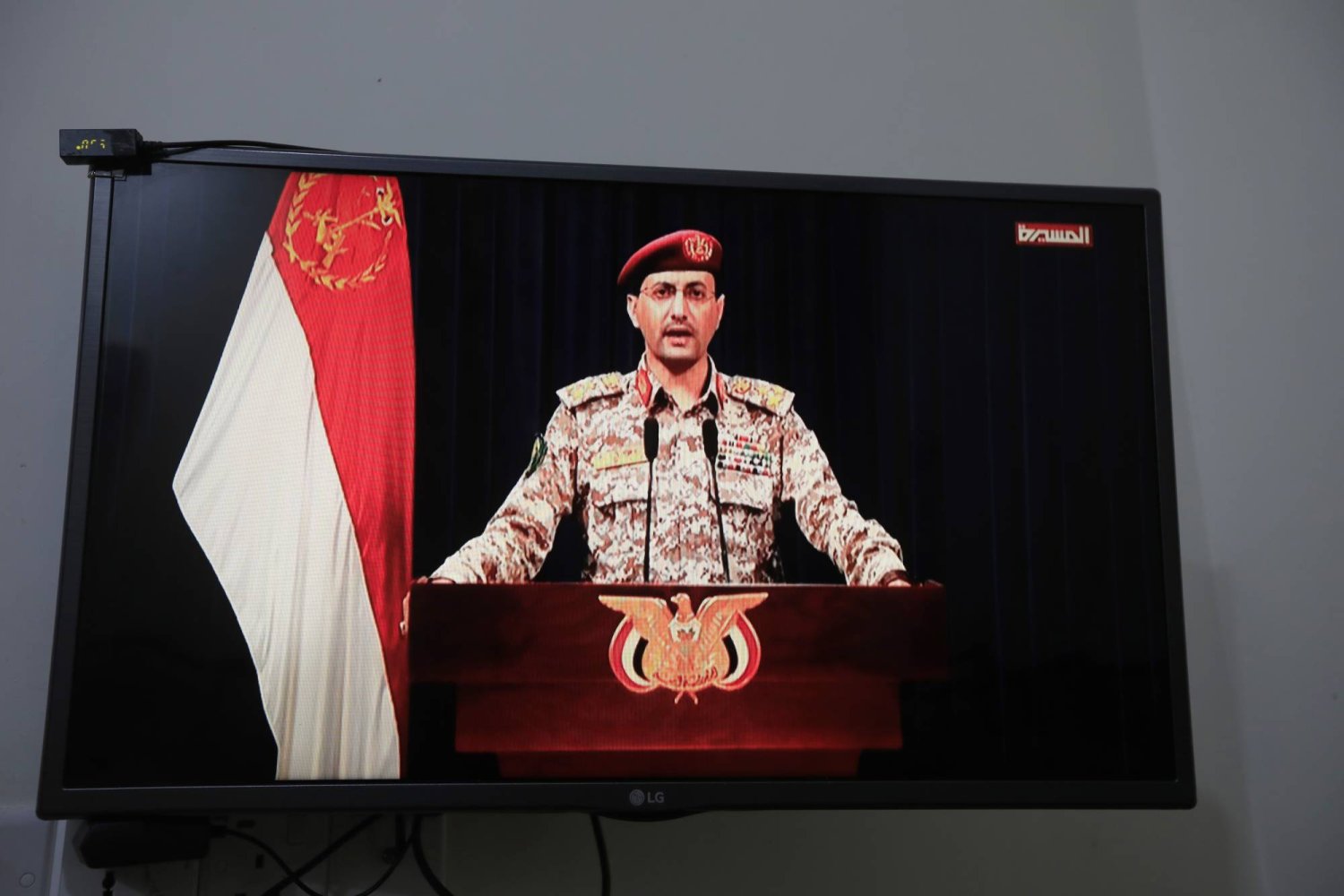 Houthi military spokesman Yahya Sarea delivers a televised statement over a new shipping attack, in Sana'a, Yemen, early 27 April 2024. EPA/YAHYA ARHAB