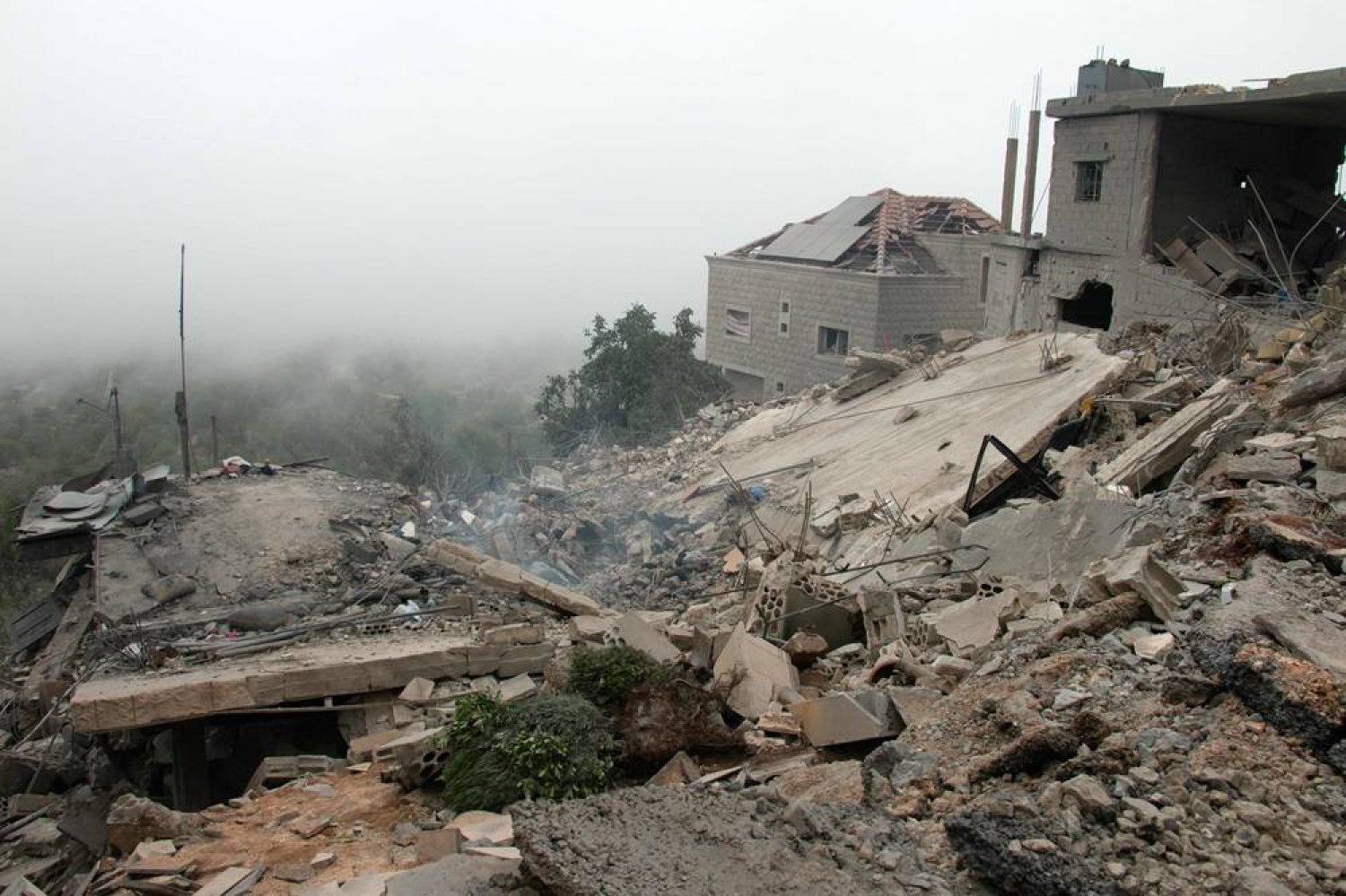A house lies in ruins in the border village of Kfar Shouba in southern Lebanon, following an Israeli strike on April 27, 2024 , amid ongoing cross-border tensions as fighting continues between Israel and Palestinian Hamas fighters in Gaza. (AFP)