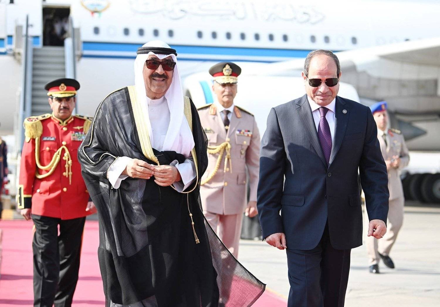 Emir of Kuwait Sheikh Mishal al-Ahmad al-Jaber Al-Sabah is welcomed by President Abdel Fattah al-Sisi upon his arrival in Egypt. (KUNA)
