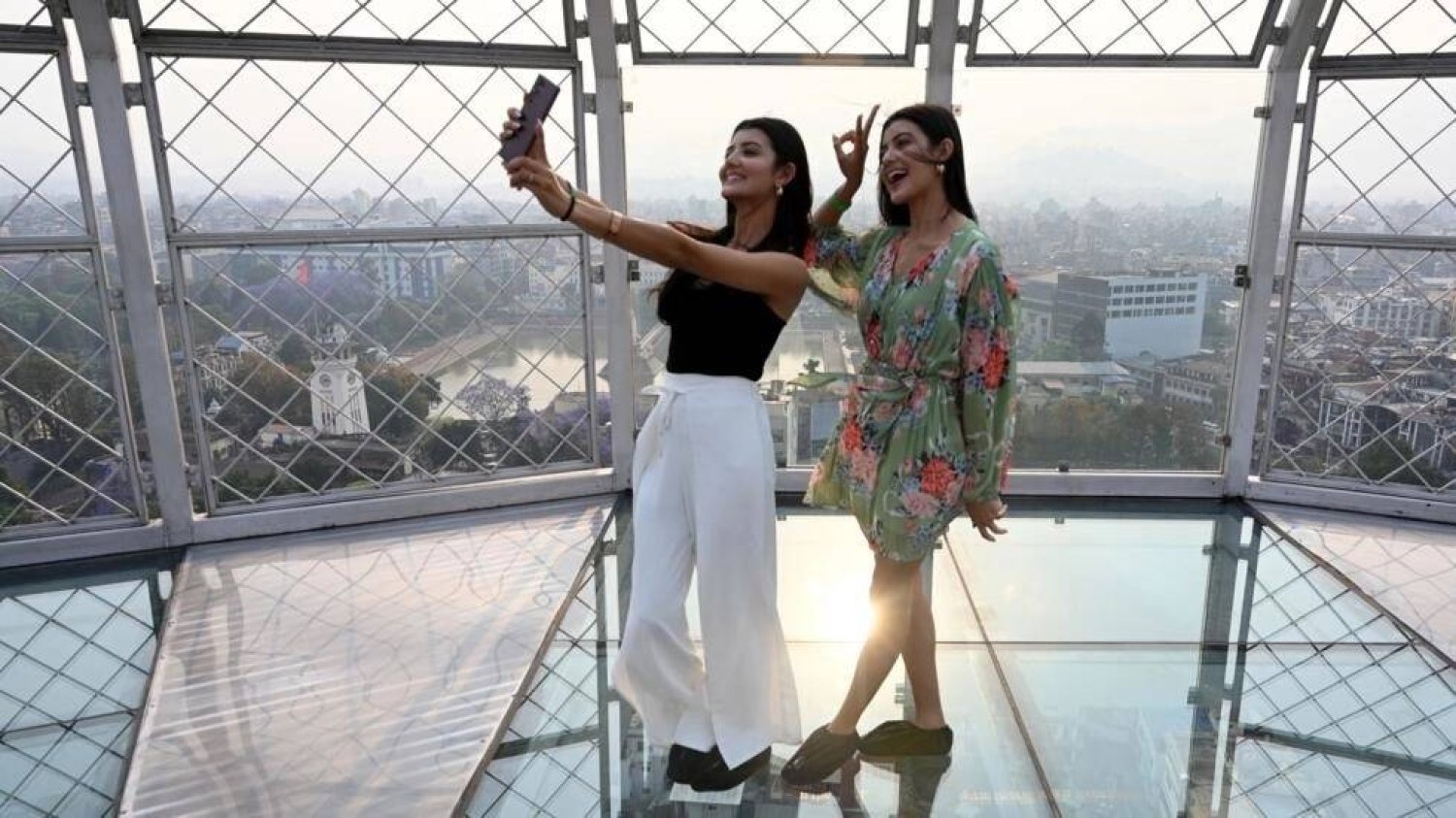 After joining TikTok in 2018, twin sisters Prisma and Princy Khatiwada built a following of nearly eight million on TikTok with videos of their synchronised dance routines. PRAKASH MATHEMA / AFP
