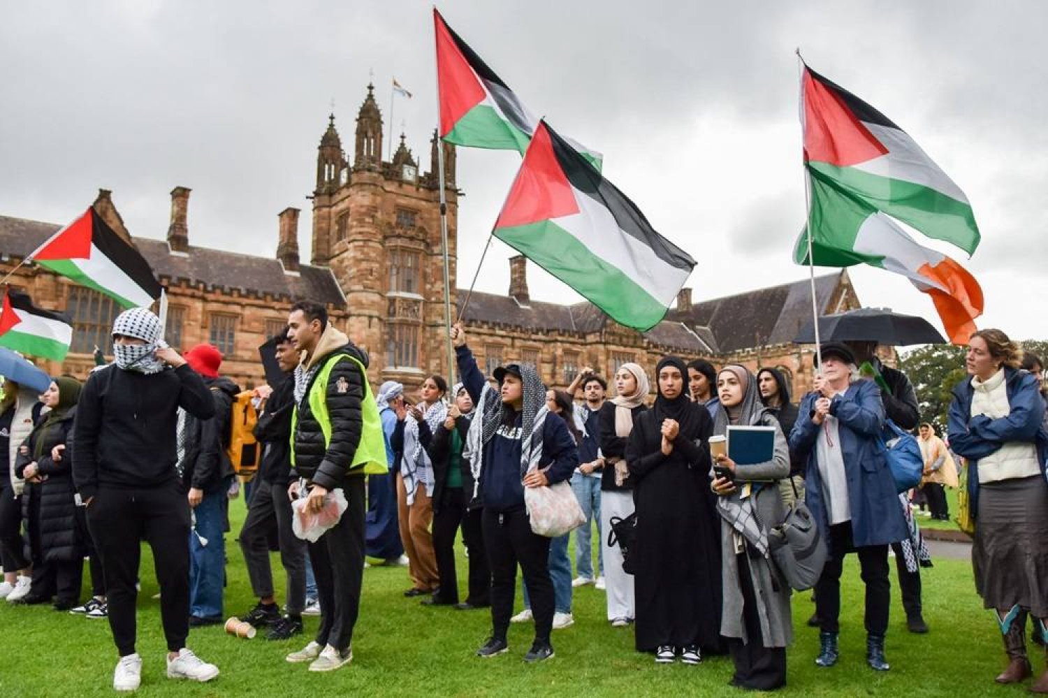 Members of the Australian Palestinian community shout slogans at the Palestinian Protest Campsite at University of Sydney in Sydney on May 3, 2024. (AFP)