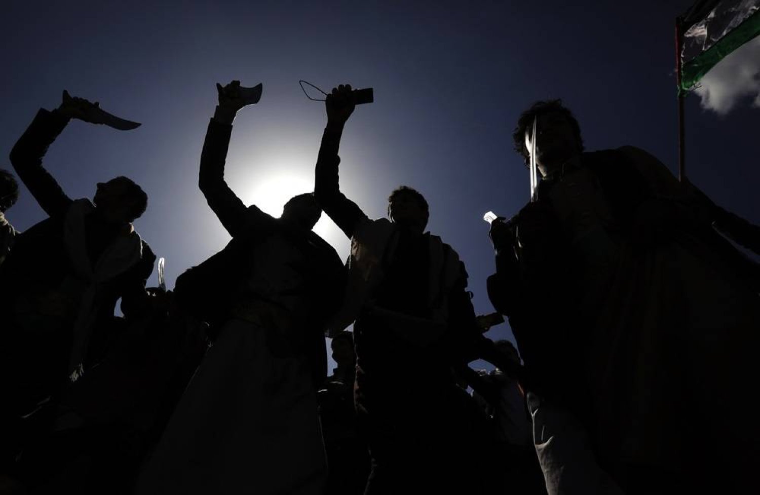 Houthi supporters are silhouetted while attending a protest against the US and Israel, and in solidarity with the Palestinian people, in Sanaa, Yemen, 03 May 2024. (EPA)