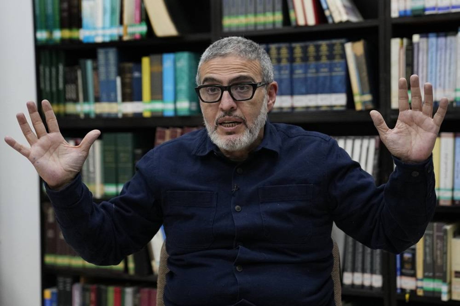 Dr. Ghassan Abu Sitta, a Palestinian-British surgeon specializing in conflict medicine, speaks during an interview at the Institute for Palestine Studies in Beirut, Lebanon, Saturday, Dec. 9, 2023. (AP)