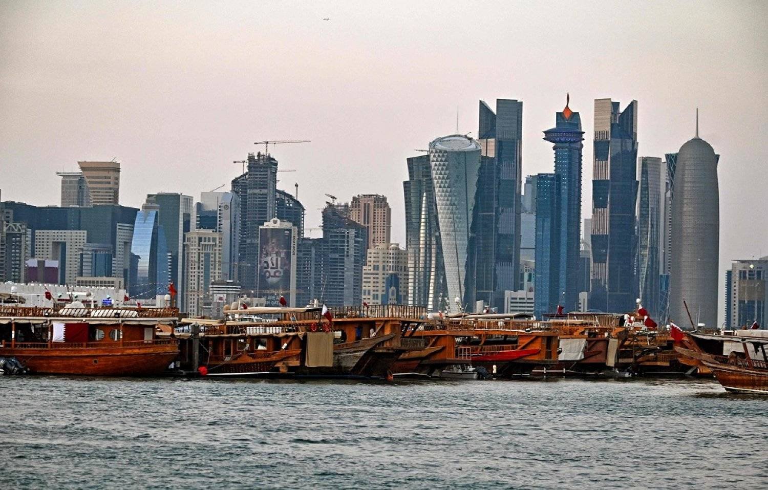 This file photo taken on Dec. 20, 2019, shows a view of boats moored in front of high-rise buildings in the Qatari capital, Doha. (AFP)
