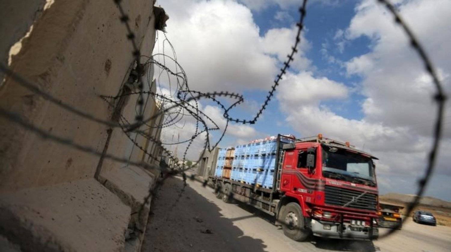 File Photo: A truck carrying goods arrives at Kerem Shalom crossing in Rafah in the southern Gaza Strip, August 15, 2018. (Reuters)
