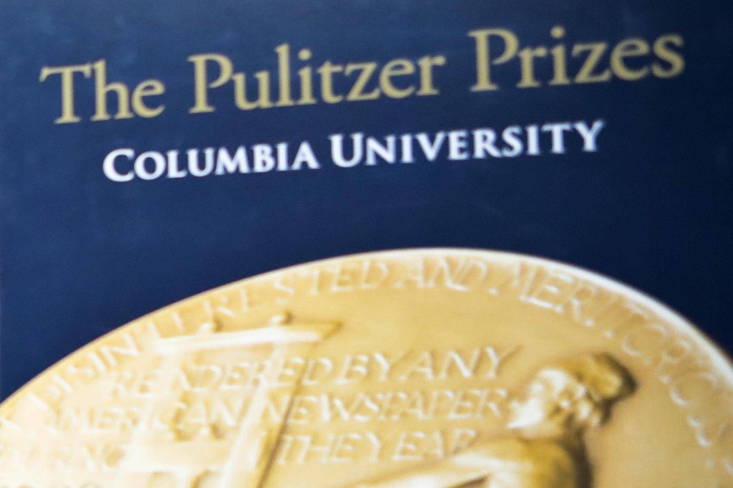 File- Signage for The Pulitzer Prizes appear at Columbia University, May 28, 2019, in New York. (AP Photo/Bebto Matthews, File)

