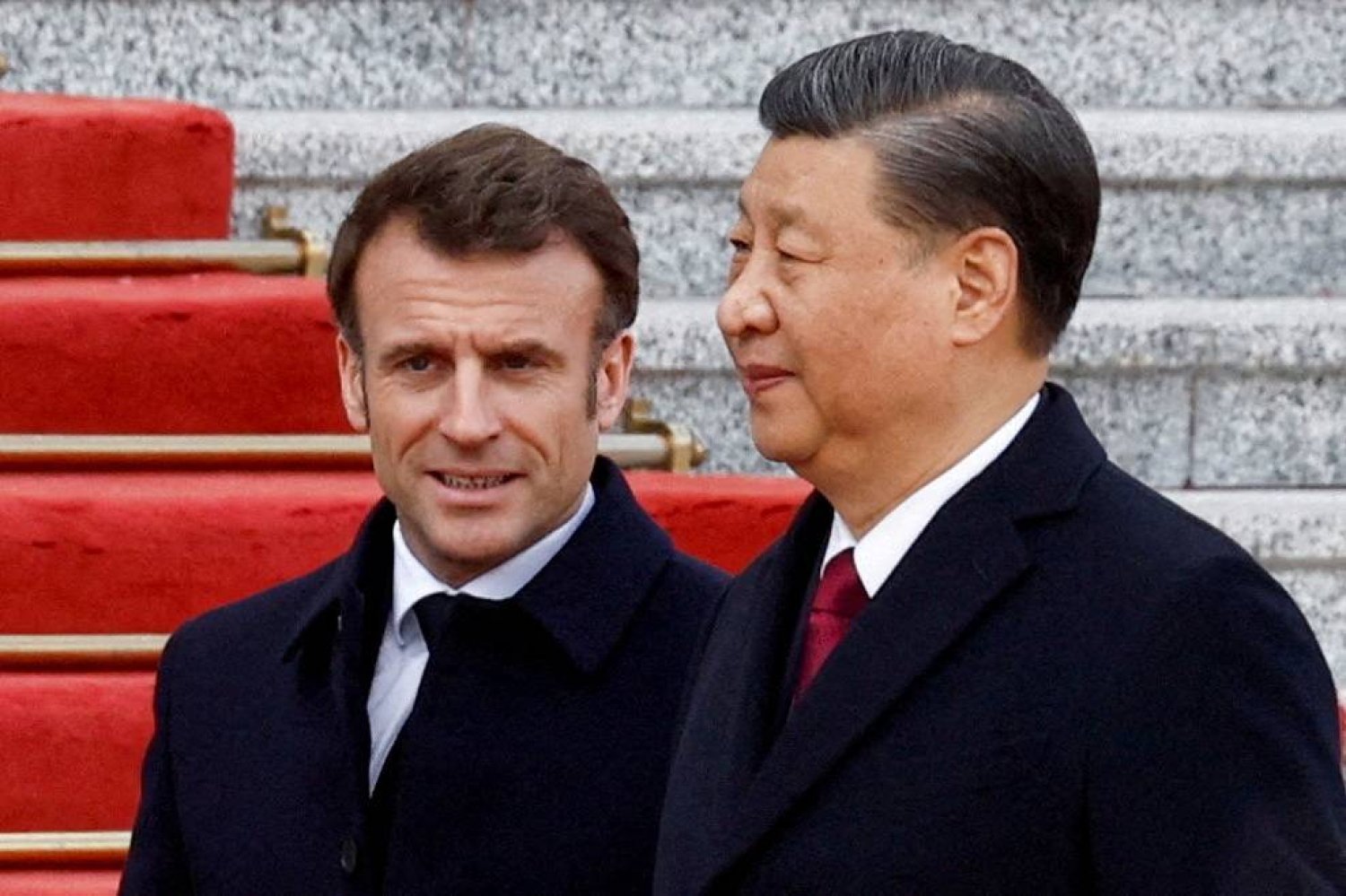 Chinese President Xi Jinping welcomes French President Emmanuel Macron at the Great Hall of the People, in Beijing, China, April 6, 2023. (Reuters)
