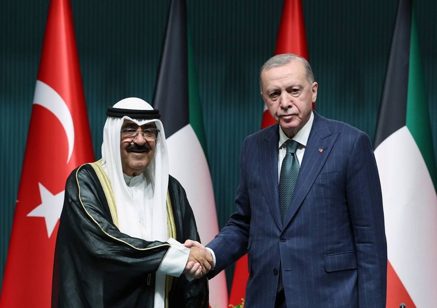A handout photo made available by the Turkish Presidential Press Office shows Turkish President Recep Tayyip Erdogan (R) and Emir of Kuwait Sheikh Meshal al-Ahmad Al-Jaber Al-Sabah (L) during a signing ceremony after their meeting at the Presidential Palace in Ankara, Turkey, 07 May 2024. (EPA/Turkish Presidential Press Office Handout) 