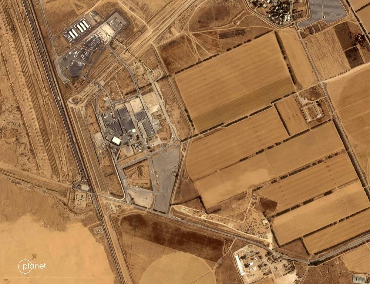 This handout satellite picture obtained from Planet Labs PBC and taken on May 3, 2024 shows a wide view of the Kerem Shalom border crossing between Israel and the Gaza Strip. (Photo by Planet Labs Inc. / AFP) / 