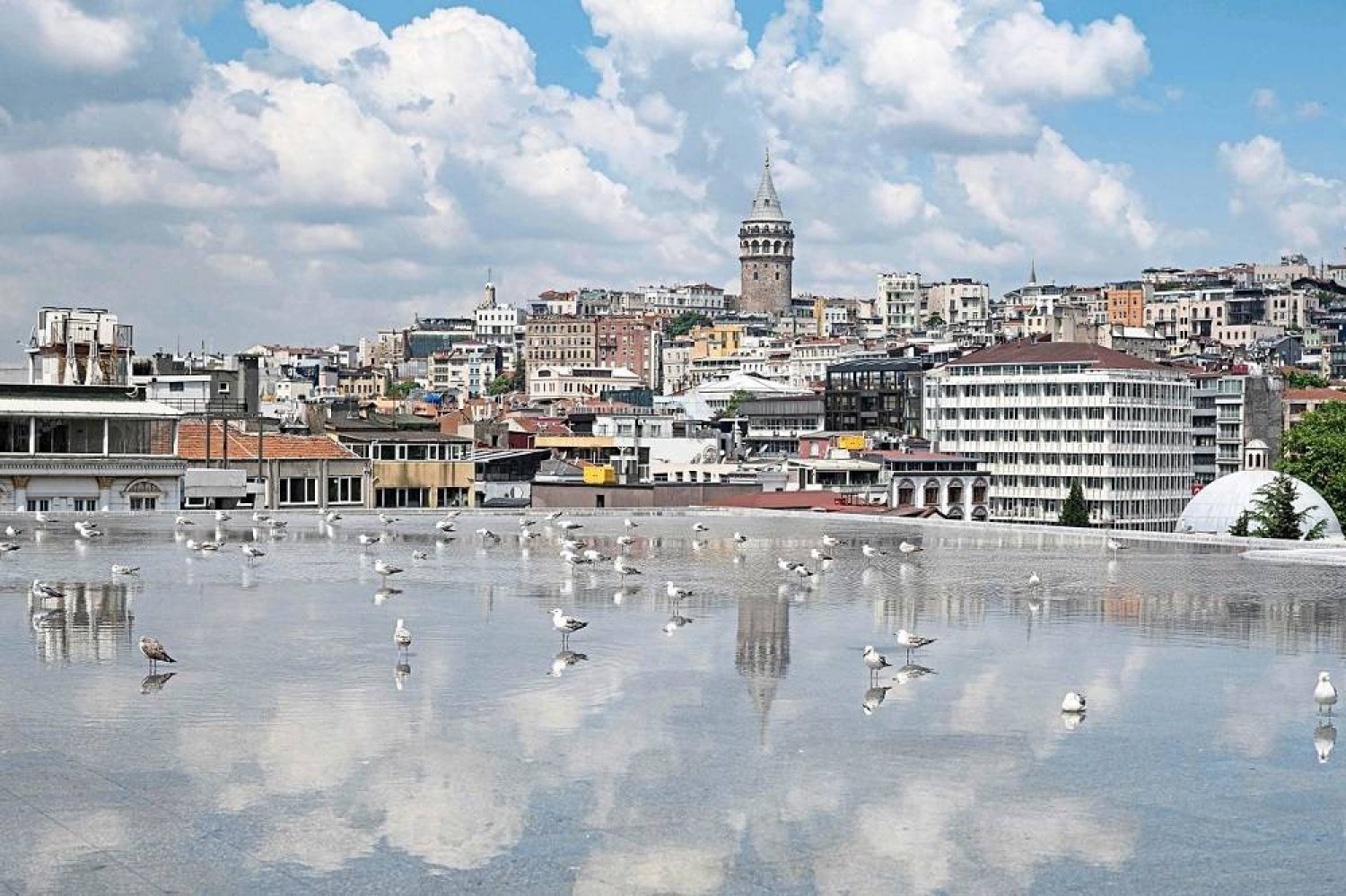 An exterior view of the new Istanbul Modern Art Museum building looking towards the Galata tower in Istanbul. (AFP)