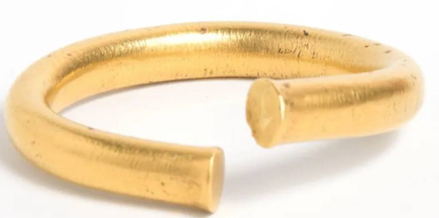 The gold bracelet is about 3,000 years old and was found in 2011 in East Cambridgeshire by a metal detectorist. Photo: Cambridgeshire County Council
