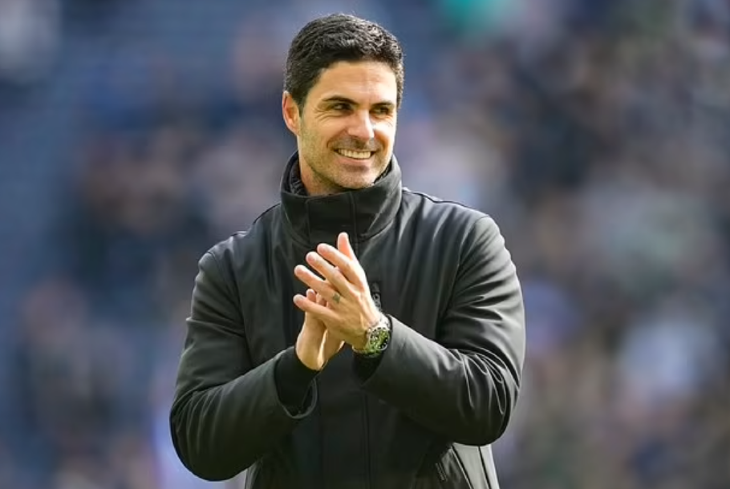 Arsenal's manager Mikel Arteta celebrates at the end of the English Premier League soccer match between Tottenham Hotspur and Arsenal at the Tottenham Hotspur Stadium in London, England, Sunday, April 28, 2024. (AP Photo/Kin Cheung)

