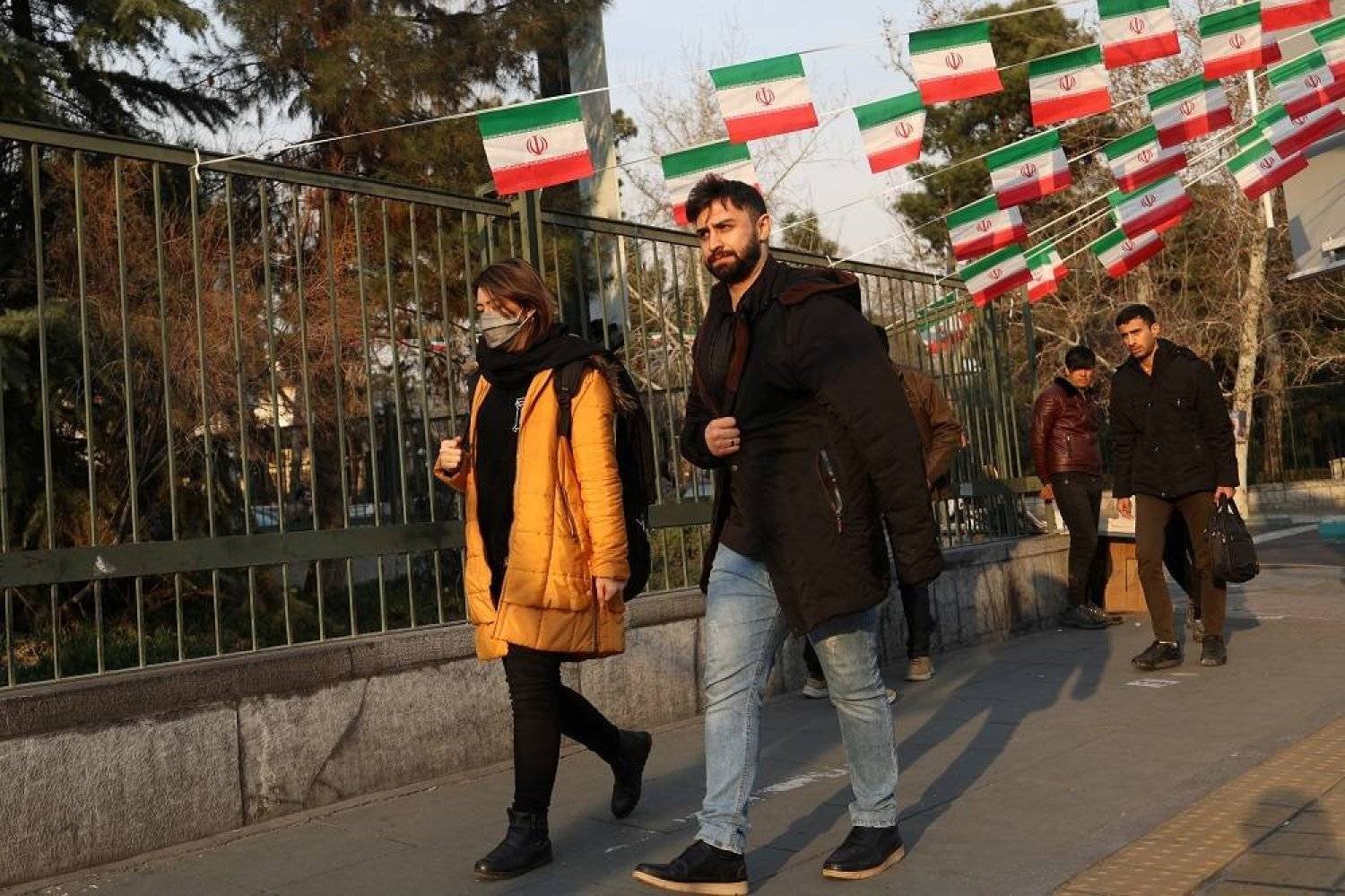 Iranians walk in a street in Tehran, Iran March 3, 2024. Majid Asgaripour/WANA (West Asia News Agency) via Reuters
