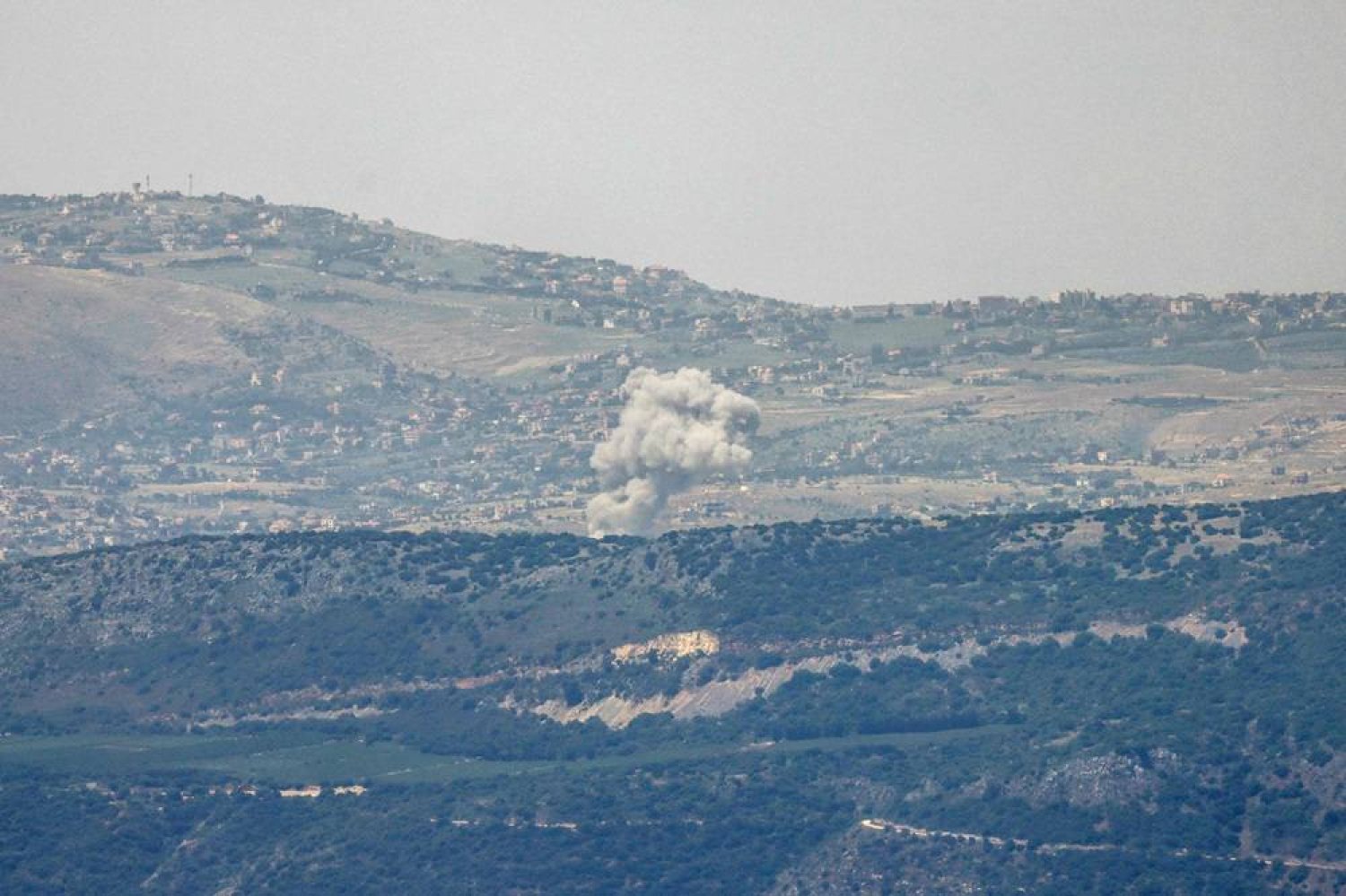  A picture taken from a position by the northern Israeli border with Lebanon shows smoke billowing during Israeli bombardment in southern Lebanese territory on May 10, 2024, amid ongoing cross-border tensions. (AFP) 