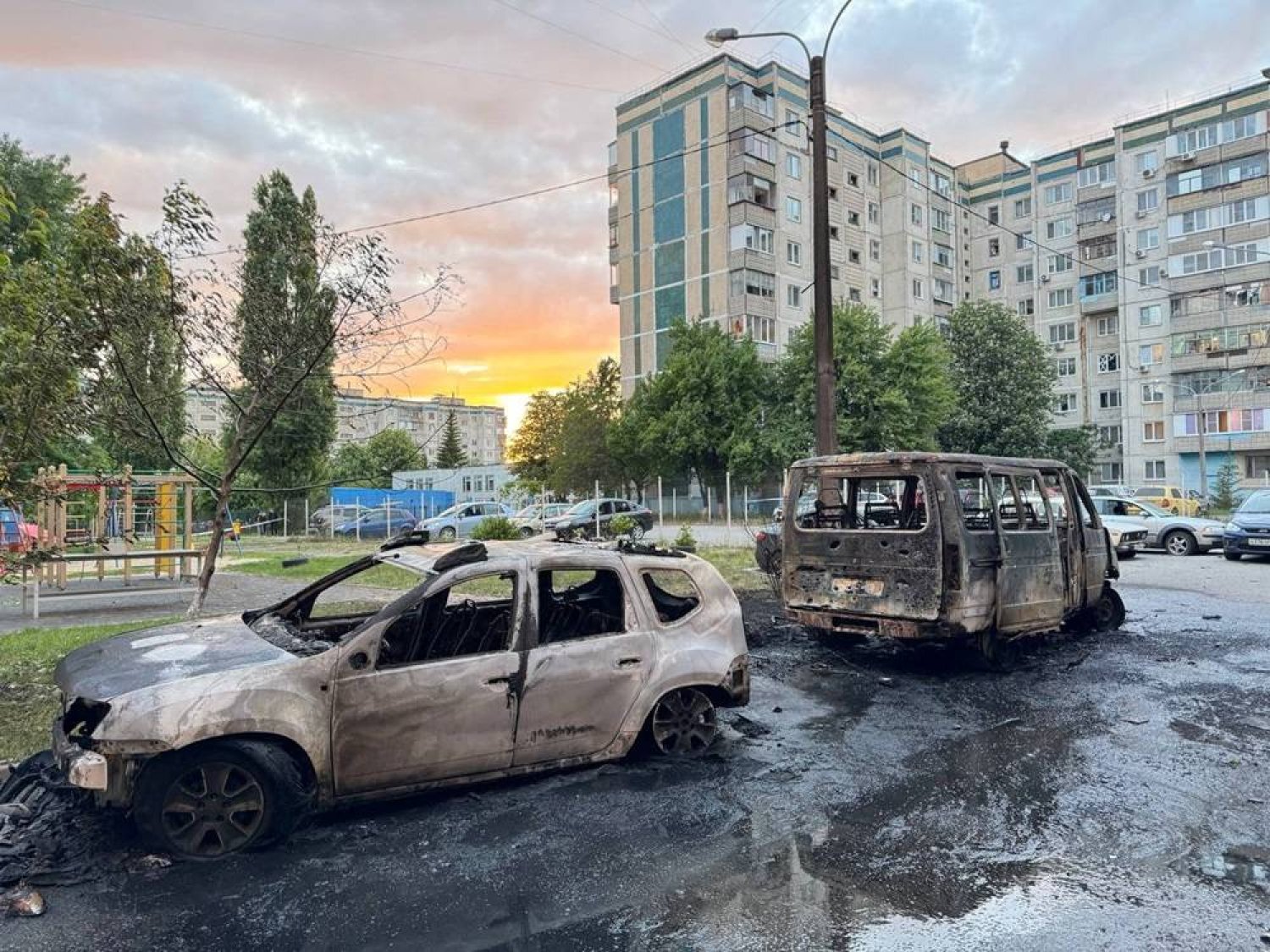 A view shows damaged vehicles at the site of a recent military strike, what local authorities called a Ukrainian air attack, in the course of the Russia-Ukraine conflict, in a location given as Belgorod, Russia, in this handout image released on May 11, 2024. (Governor of Russia's Belgorod Region Vyacheslav Gladkov via Telegram/Handout via Reuters) 