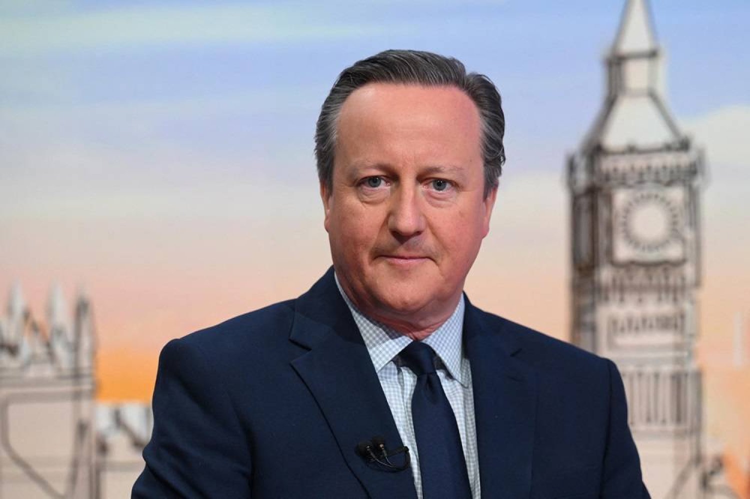 A handout picture released by the BBC, taken and received on May 12, 2024, shows Britain's Foreign Secretary David Cameron appearing on the BBC's 'Sunday Morning' political television show with journalist Laura Kuenssberg. (Photo by JEFF OVERS / BBC / AFP) 