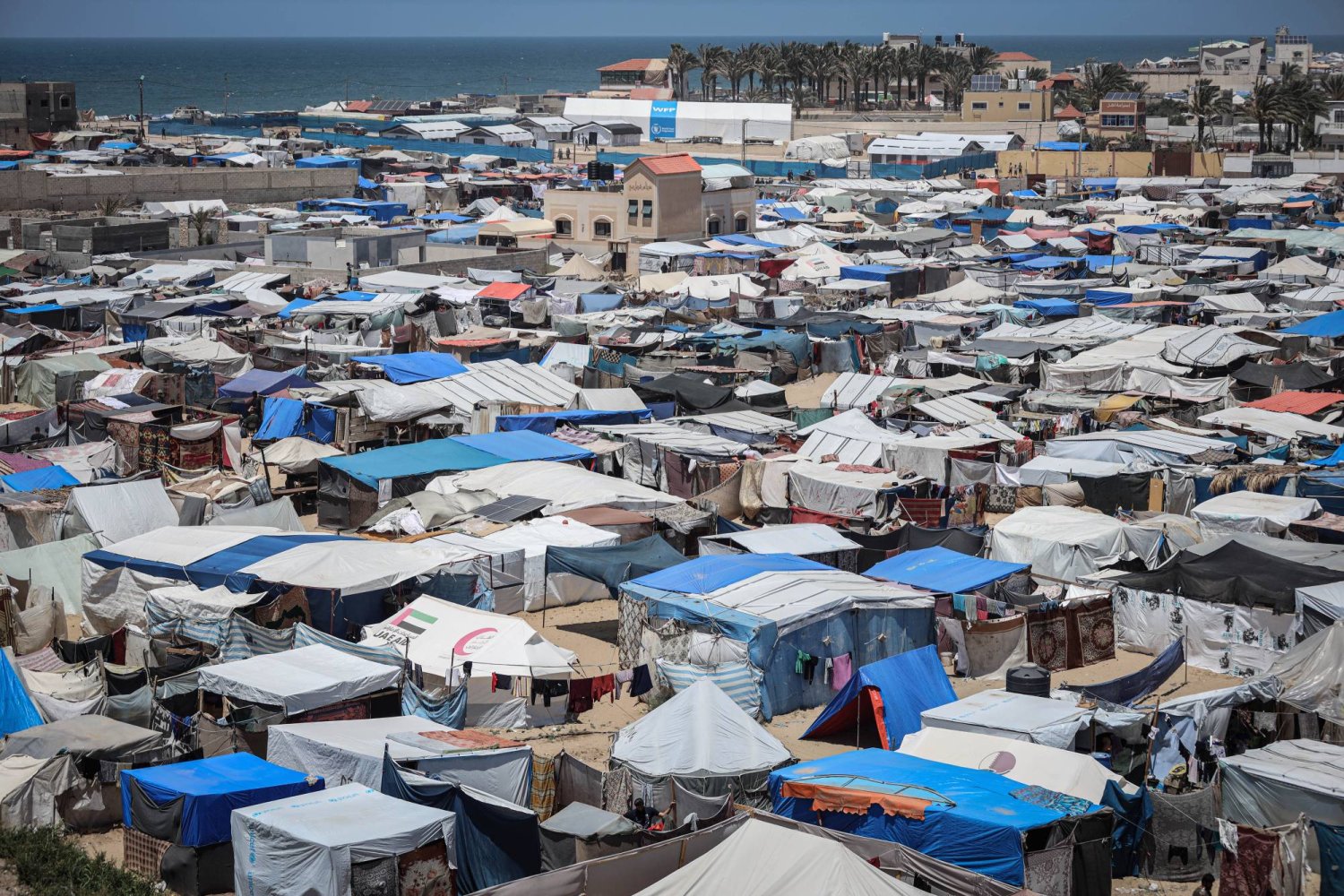 12 May 2024, Palestinian Territories, Deir al-Balah: Tents for displaced people are crowded west of Deir al-Balah city in the central Gaza Strip after thousands of Palestinians fled Rafah after the Israeli army announced the start of a military operation there. Photo: Saher Alghorra/ZUMA Press Wire/dpa
