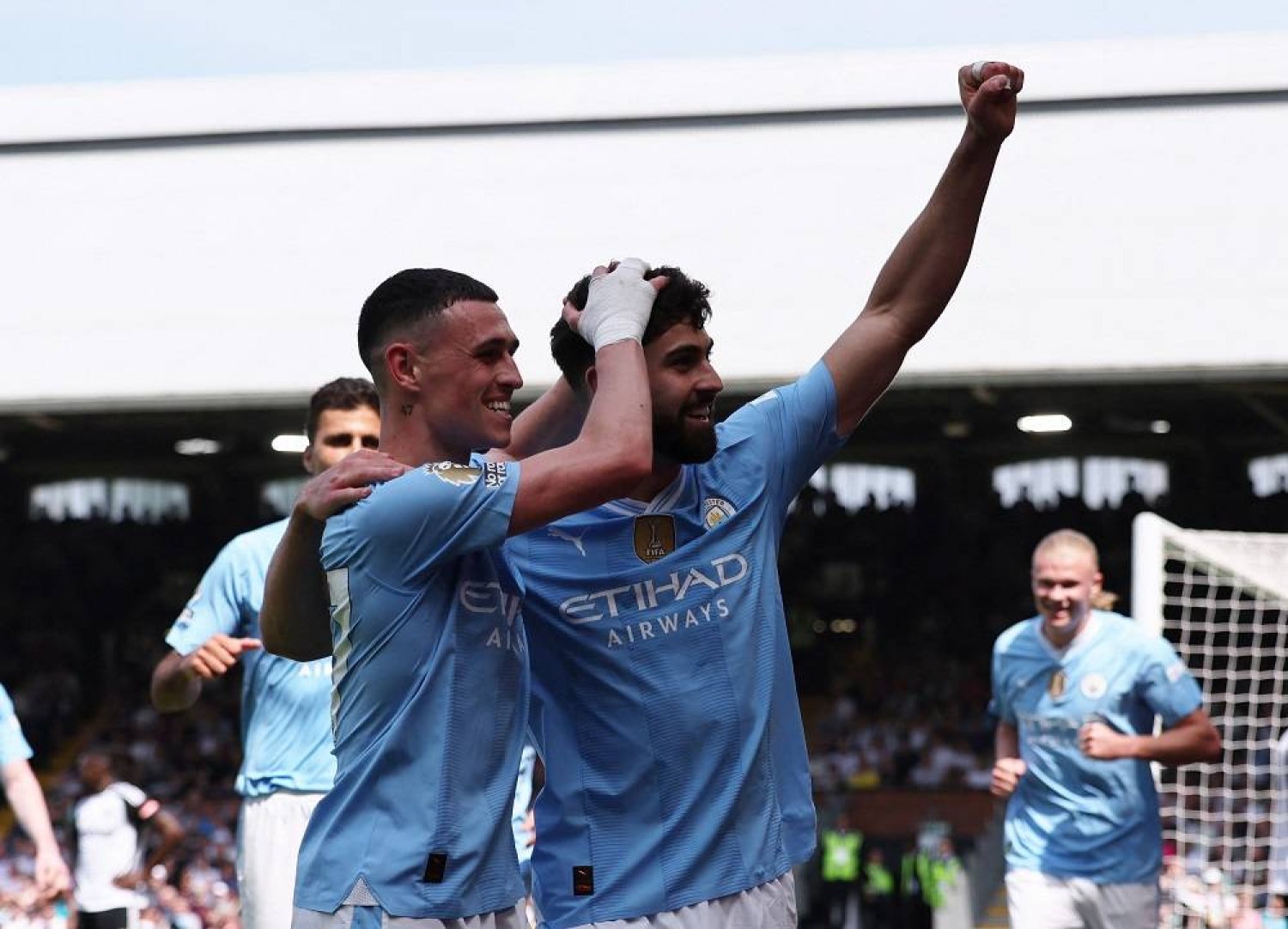 Football - Premier League - Fulham v Manchester City - Craven Cottage, London, Britain - May 11, 2024 Manchester City's Josko Gvardiol celebrates scoring their third goal with Phil Foden. (Reuters)