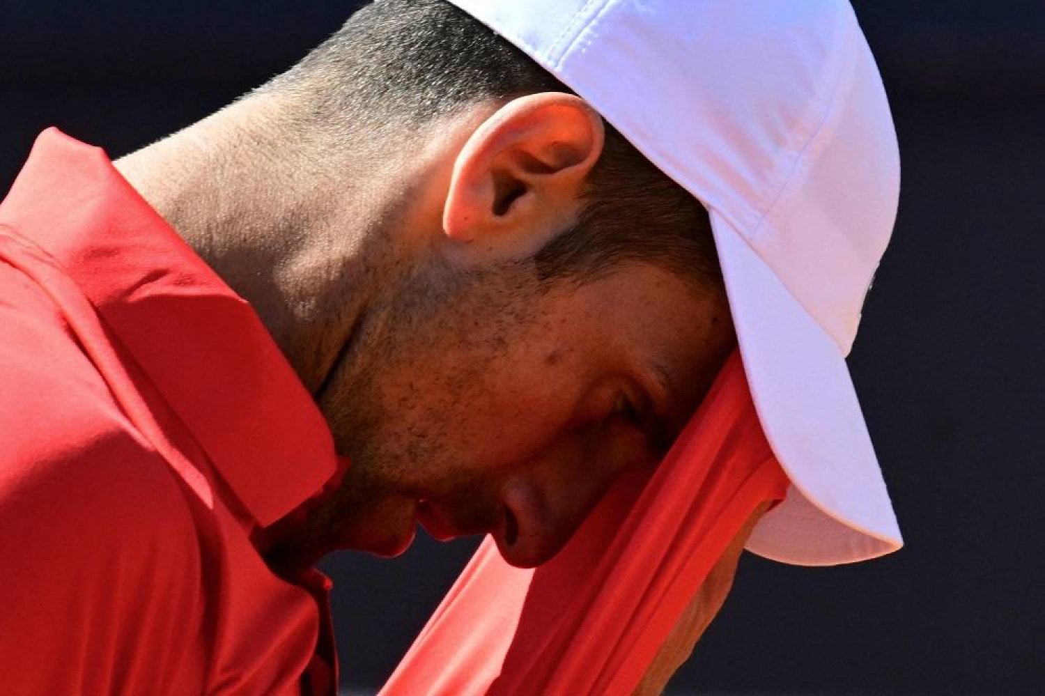 Serbia's Novak Djokovic reacts during his match against Chile's Alejandro Tabilo at the Men's ATP Rome Open tennis tournament at Foro Italico in Rome on May 12, 2024. (AFP)