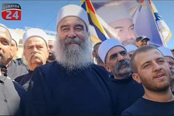 Sheikh Hikmat al-Hajri among the protesters in Sweida, Syria. (Suwayda24) 